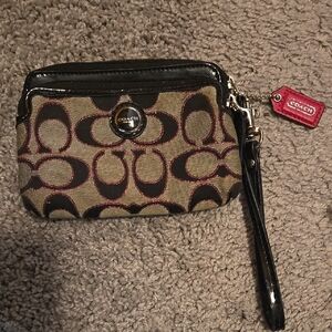 Coach Signature Wristlet in Black and Brown